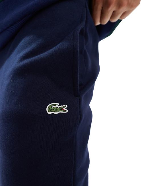 Lacoste logo slim sweatpants in navy ASOS