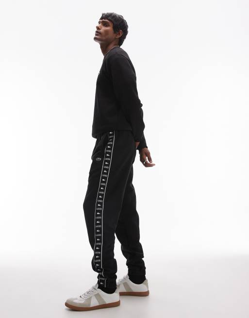 Lacoste logo stripe sweatpants in black 