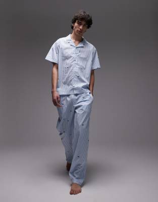 Lacoste Lacoste loungewear trousers in light blue with all over croc print