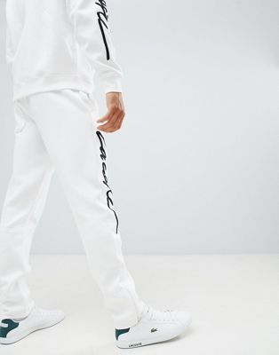 lacoste white joggers