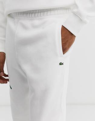 white lacoste joggers