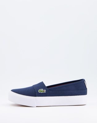 white plimsolls slip on
