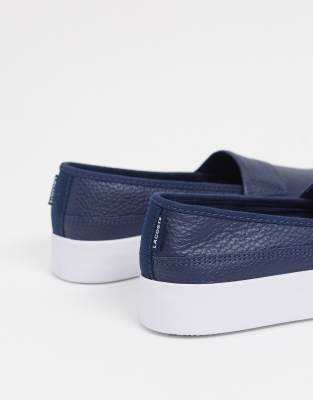 slip on navy trainers