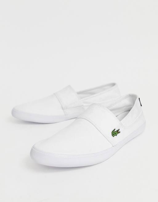 Lacoste white sale slip on