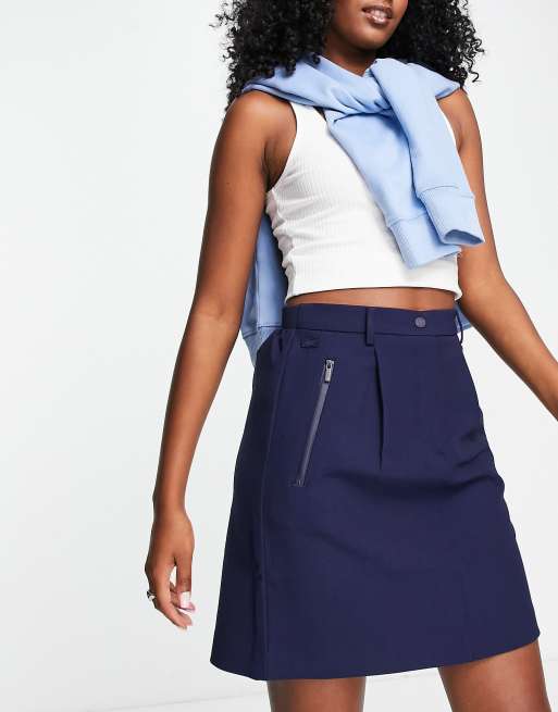 Lacoste – Marinblå, a-linjeformad minikjol med ficka med dragkedja 