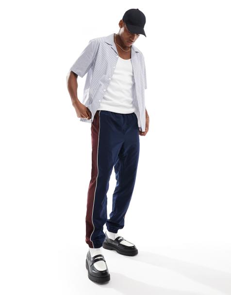 Lacoste – Marinblå blockfärgade sweatpants - view 1