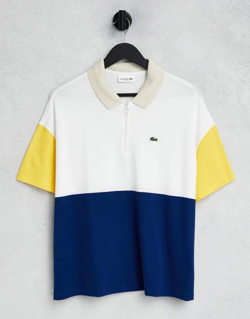 Lacoste – Marinblå, gul, blockfärgad pikétröja med logga