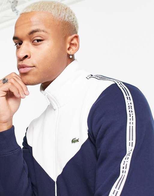 Lacoste – Marinblå och vit, blockfärgad sweatshirt med tejpad logga och dragkedja