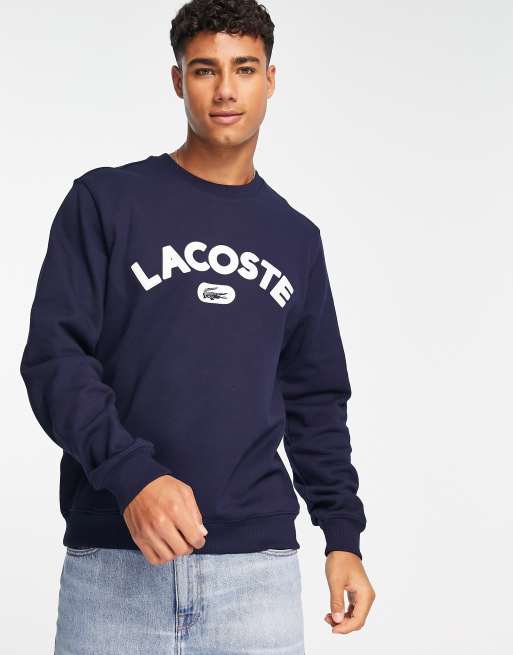 Lacoste – Marinblå sweatshirt med logga på bröstet