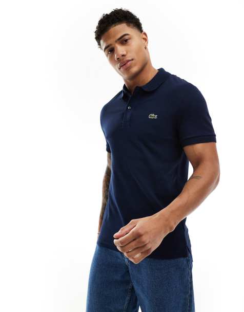 Lacoste – Marineblaues Piqué-Polohemd in schmaler Passform - view 1