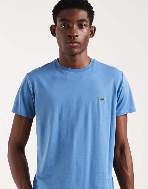 Lacoste - Mellemblå T-shirt med logo i pima-bomuld - view 1