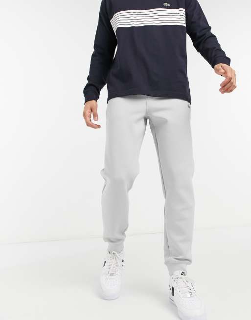 Lacoste motion stretch cotton track pants | ASOS