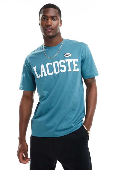 Lacoste – Niebieski T-shirt z logo z przodu