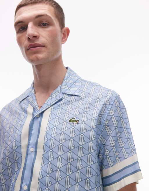 Lacoste - Overhemd met korte mouwen en reverskraag in blauw met witte monogramprint, 2 van 4
