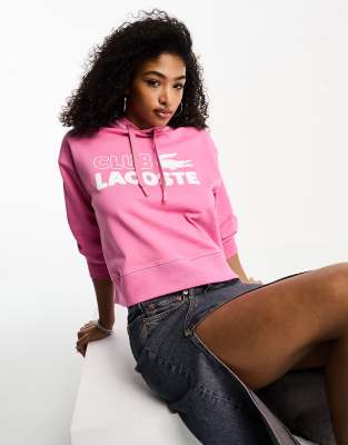 Lacoste - Oversize-Kapuzenpullover in Mittelrosa mit kurzem Schnitt und Logo