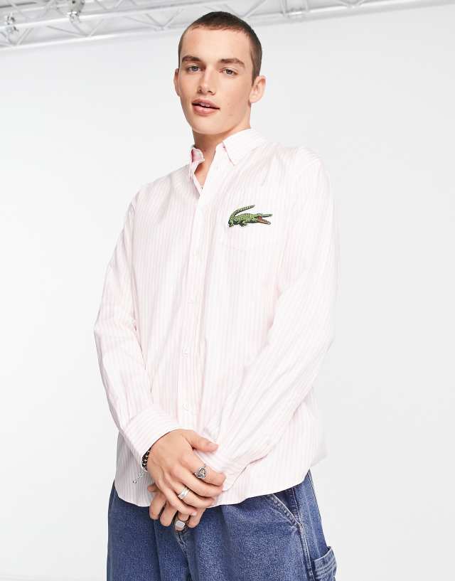 Lacoste oversized stripe shirt in pink