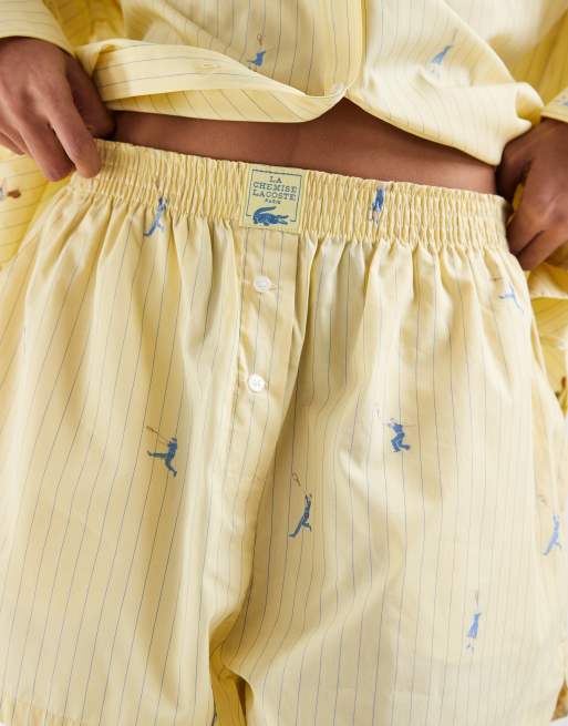 Lacoste - Pantaloncini gialli con mini tennista in coordinato, 4 di 5