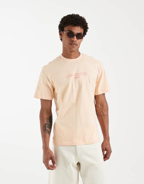 Lacoste – Persikofärgad t-shirt med avslappnad passform och logga på bröstet - view 1
