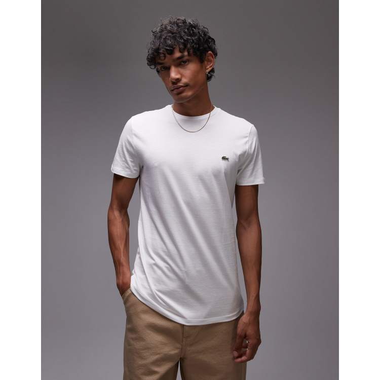 Lacoste ホワイト Tシャツ Lacoste logo-embroidered crew-neck T-shirt | White | FARFETCH