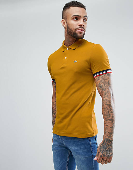 Lacoste Pique Tipped Cuff Polo Shirt In Mustard | ASOS