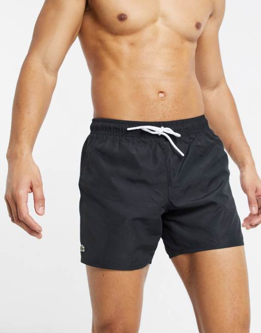 Lacoste plain logo swim shorts in black