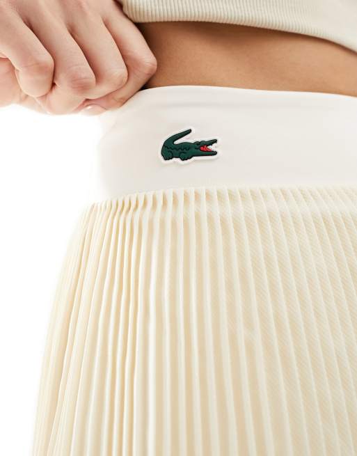 Lacoste pleated tennis skirt with under shorts in off white