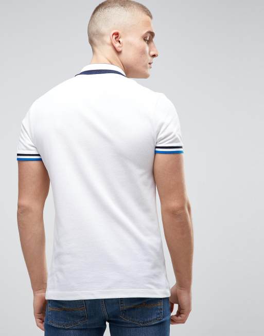 Lacoste Polo in piqu slim bianca con bordi a 3 colori e logo a