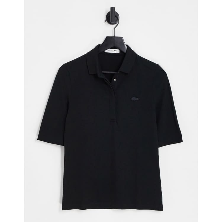 Polo noir 2024 lacoste