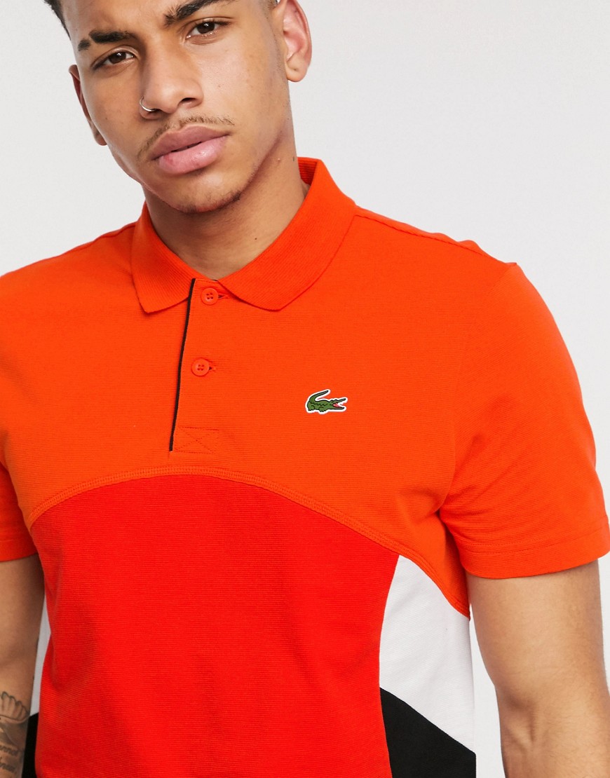 Lacoste polo with colour blocking in red