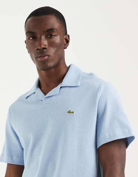 Lacoste – Polohemd in Hellblau mit Reverskragen - view 1
