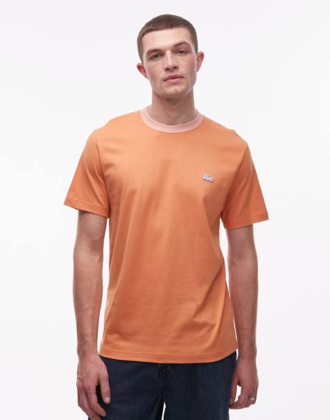 Lacoste – Pomarańczowy T-shirt oversize - view 1