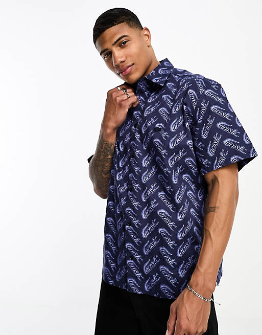 Lacoste relaxed fit all over logo short sleeve shirt in navy | ASOS