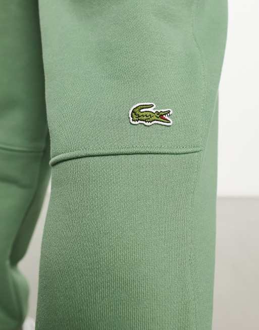 Lacoste relaxed fit joggers in green ASOS