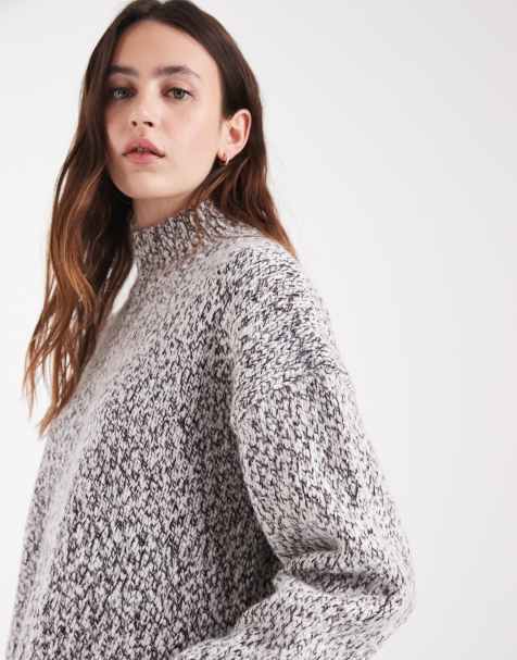 Lacoste roll neck speckled wool jumper in black and white - view 1