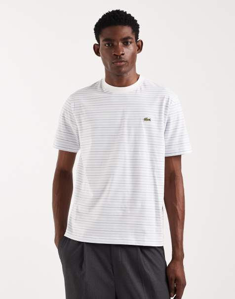 Lacoste - Ruimvallend gestreept T-shirt in lichtblauw - view 1
