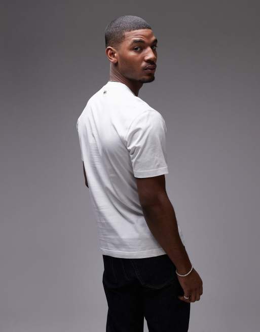Lacoste - Ruimvallend T-shirt met kleine logoprint in het midden in wit, 3 van 4