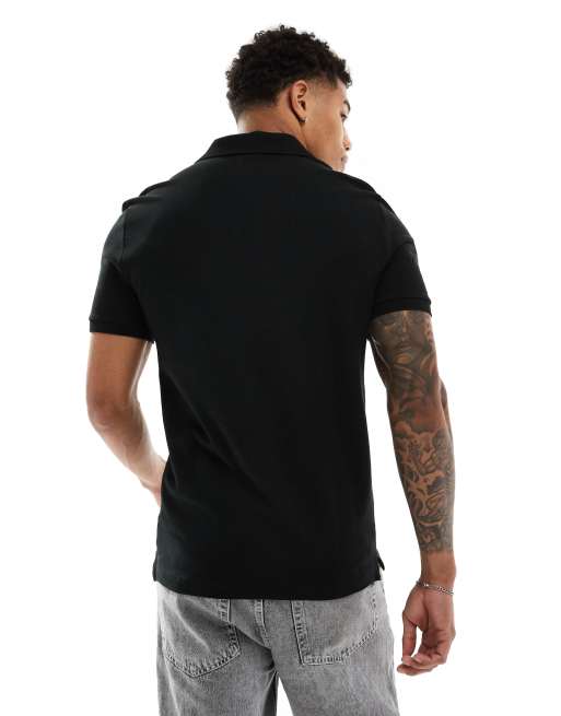 Lacoste – Schmales Piqué-Polohemd in Schwarz, 2 von 4