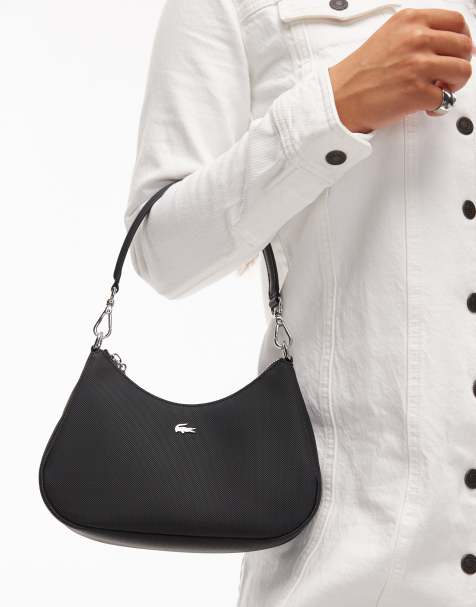 Lacoste – Schultertasche aus Nylon in Schwarz mit abnehmbarem Umhängeriemen - view 1