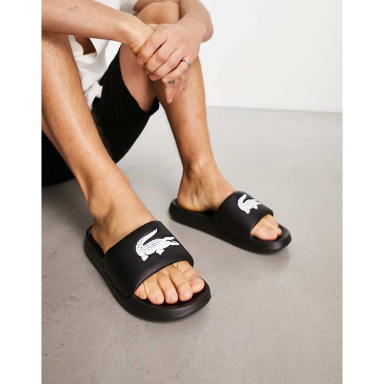 Sports direct lacoste store sliders