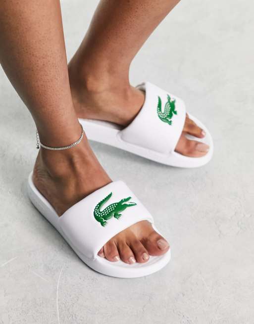 Lacoste – Serve 1.0 – Vita tofflor 
