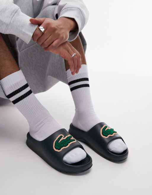 Lacoste – Serve 2.0 – Slider in Dunkelgrün mit texturiertem Logo