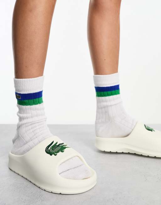 Lacoste store slides white