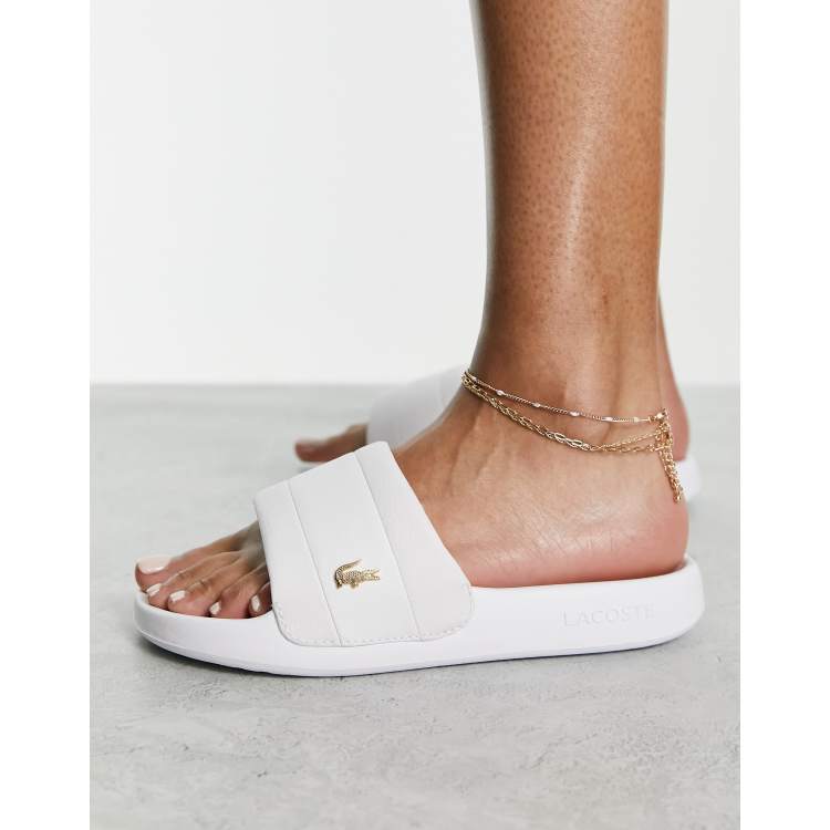 White and gold lacoste on sale slides