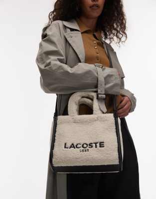 Lacoste Lacoste shearling cross body bag in natural/black-Neutral