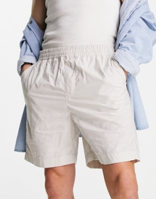 Lacoste relaxed fit shorts in beige - ASOS Price Checker