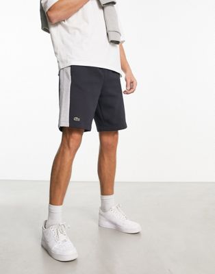 Lacoste side logo shorts in navy and grey