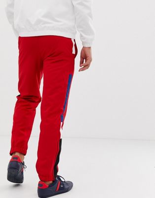 red lacoste bottoms