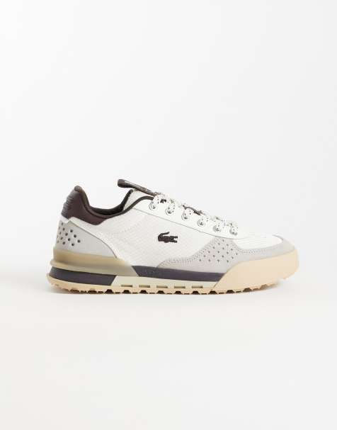 Lacoste Slam Break sneakers in crème en donkerbruin - view 1