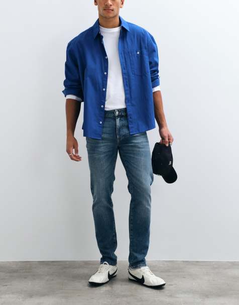 Lacoste slim fit indigo jeans in mid wash denim - view 1