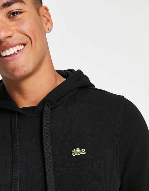 Sudadera negra con capucha y logo de Lacoste